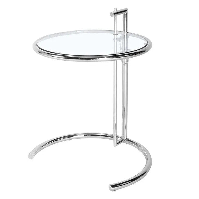 Modern side table with glass top and chrome metal legs on a white background
