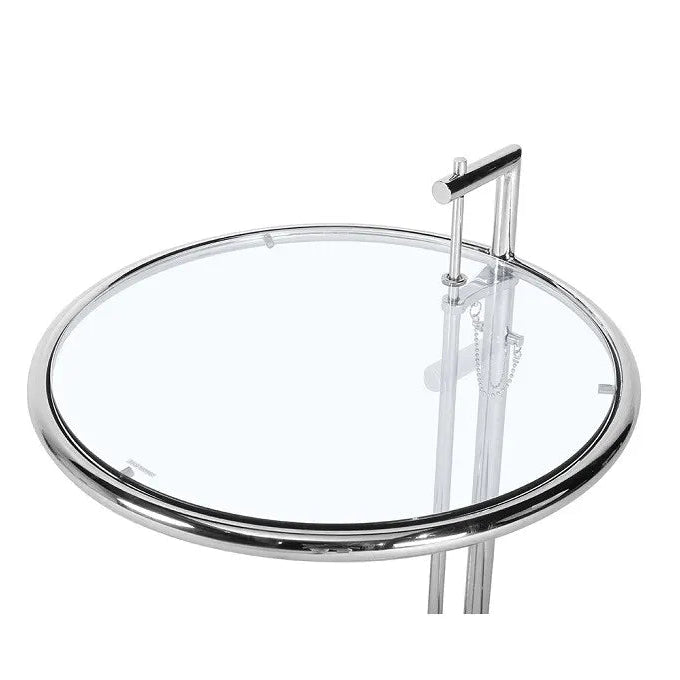 Round glass tray with metal rim and handle on a white background